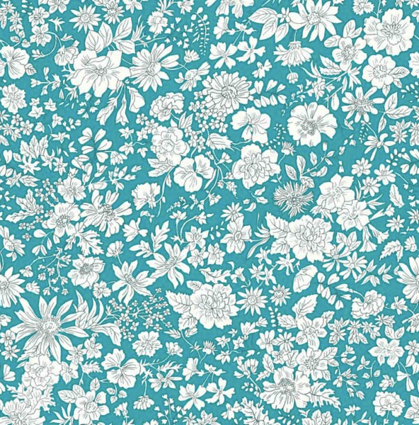 Liberty quilting fabric with white flowers on a peacock blue background