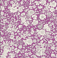 Liberty quilting fabric with white flowers on a peacock blue background